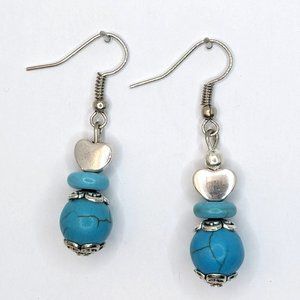 Silver heart with Turquoise semi precious stone beads.